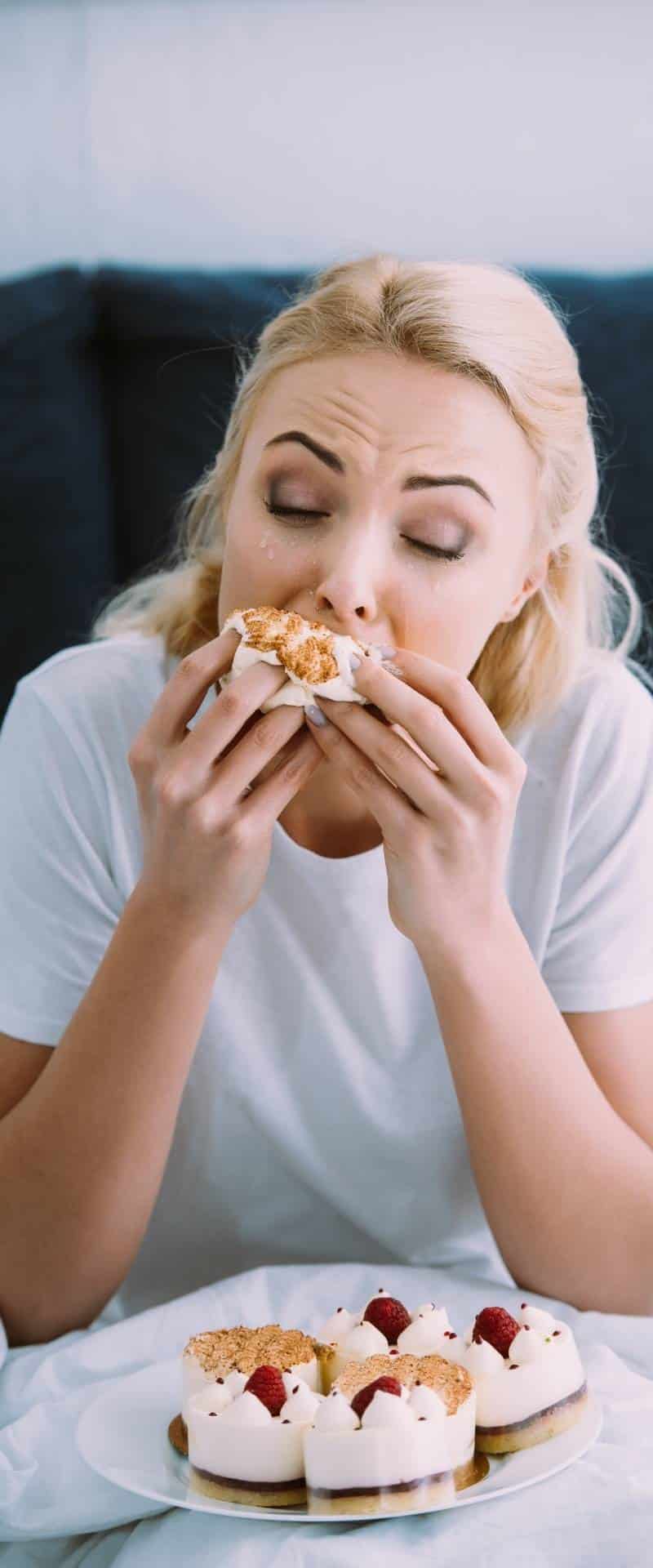 woman eating due to stress
